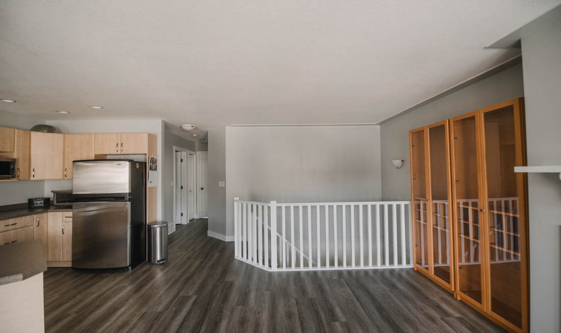 Painting a home interior with a paint sprayer