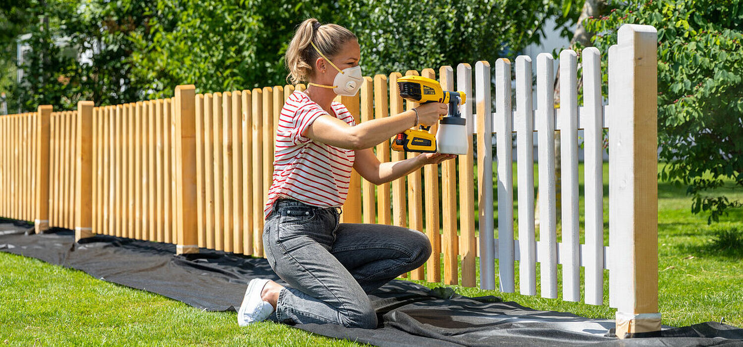How to paint a wooden fence